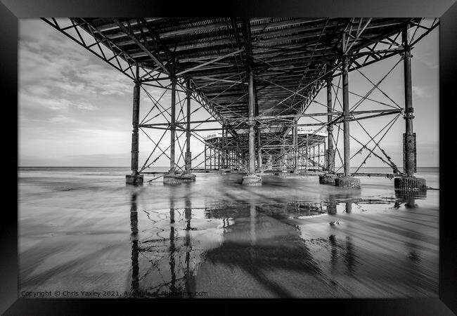 Beneath the boardwalk of Cromer pier Framed Print by Chris Yaxley
