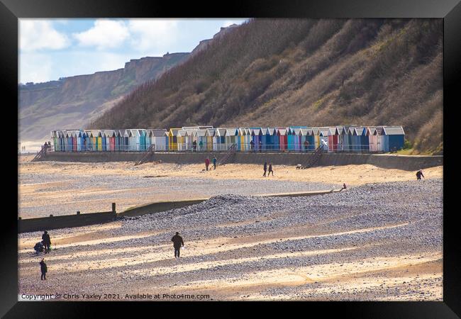 Colorful beach huts on the promenade, North Norfolk coast Framed Print by Chris Yaxley