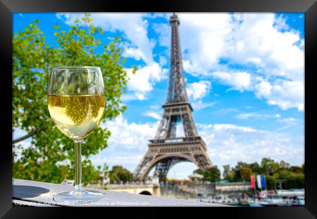 Glass of white wine with Eiffel tower view Framed Print by Maria Vonotna