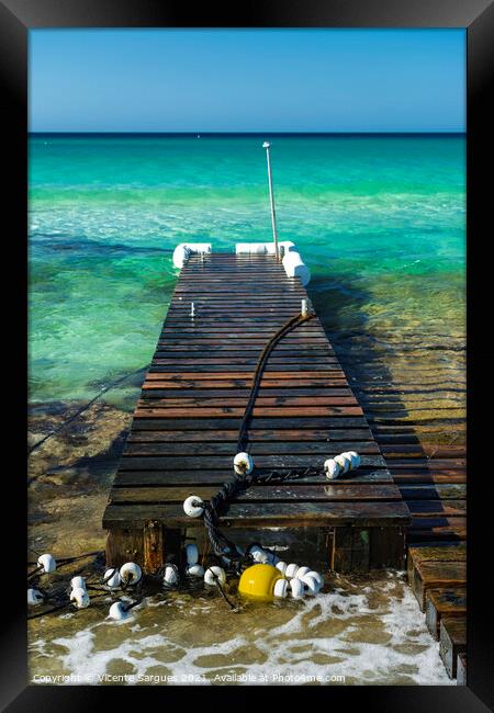 Pier and yellow buoy Framed Print by Vicente Sargues