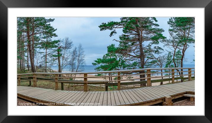 Wooden path in forest near Baltic sea Framed Mounted Print by Maria Vonotna
