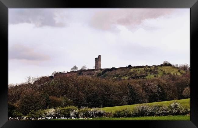A castle on top of a grass covered field Framed Print by craig hopkins