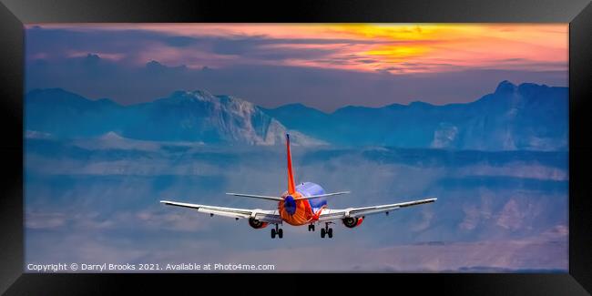 Colorful Commercial Plane Flying West Framed Print by Darryl Brooks