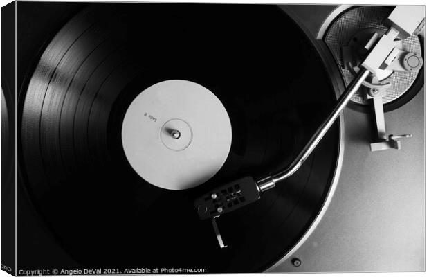 Side B Label Vinyl Record on a Turntable in Monoch Canvas Print by Angelo DeVal
