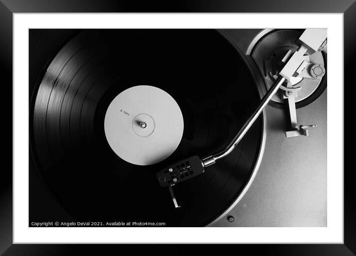 Side B Label Vinyl Record on a Turntable in Monoch Framed Mounted Print by Angelo DeVal