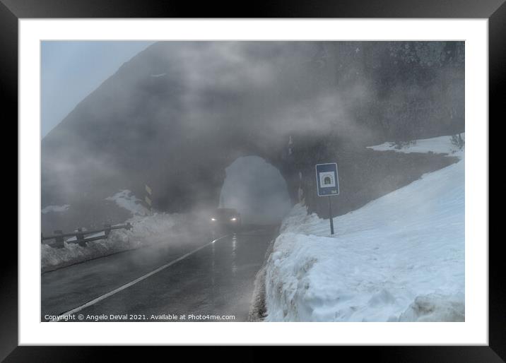 Driving by the foggy rock tunnel in Serra da Estrela Framed Mounted Print by Angelo DeVal