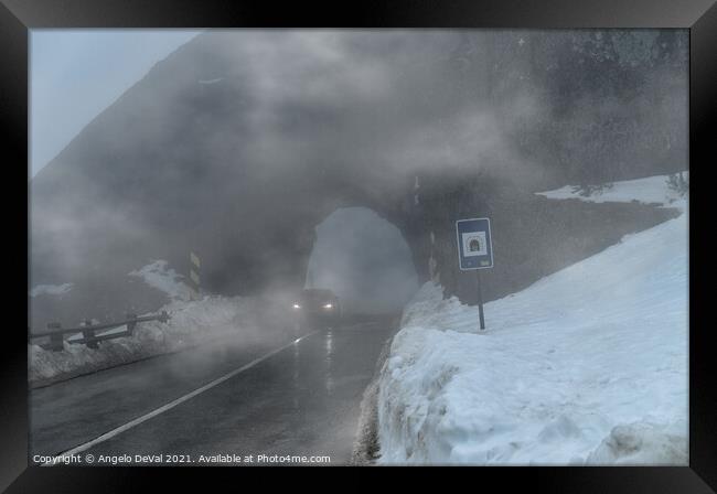 Driving by the foggy rock tunnel in Serra da Estrela Framed Print by Angelo DeVal
