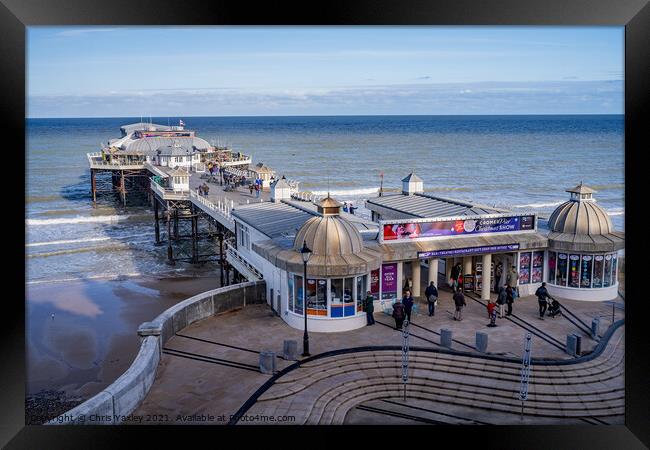 A view over Cromer pier and promenade Framed Print by Chris Yaxley