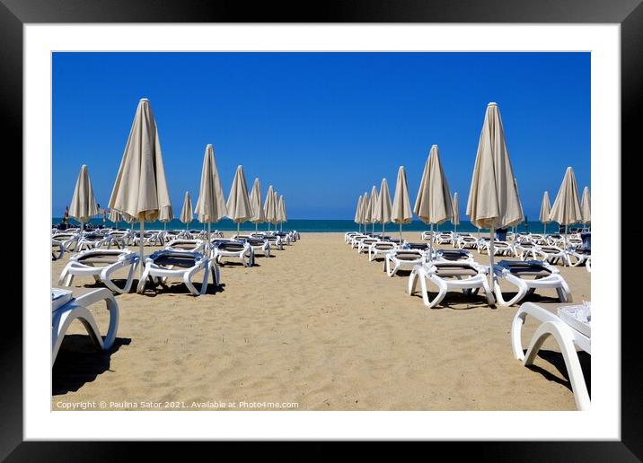 Umbrellas and chaise lounges on the sandy beach Framed Mounted Print by Paulina Sator