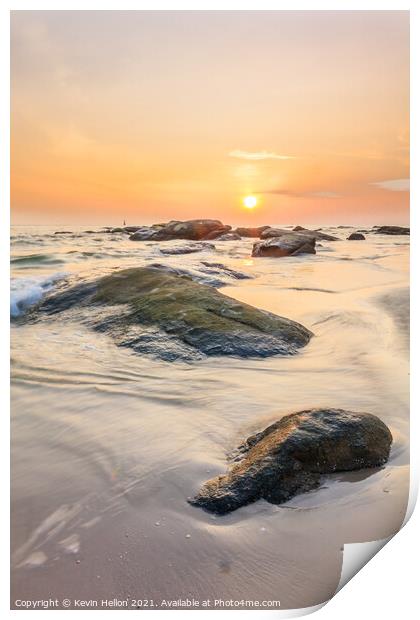 Sunrise over the rocks Print by Kevin Hellon