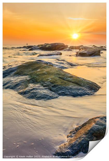 Sunrise over the rocks Print by Kevin Hellon