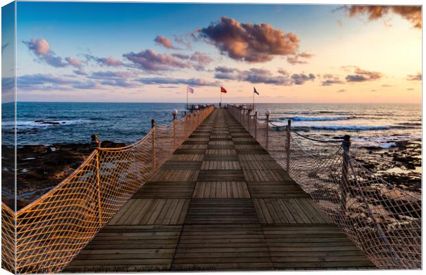Wooden pier and sunset over sea. Canvas Print by Sergey Fedoskin