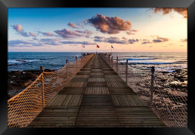 Wooden pier and sunset over sea. Framed Print by Sergey Fedoskin