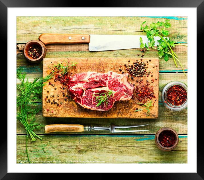 Raw meat wooden cutting board Framed Mounted Print by Mykola Lunov Mykola