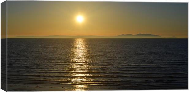 Arran silhouetted by setting sun Canvas Print by Allan Durward Photography