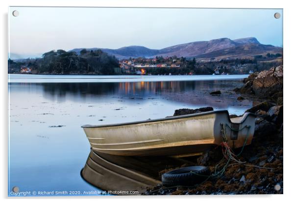 A dinghy moored at the loch's edge with reflected view of Portree  Acrylic by Richard Smith
