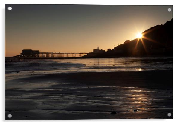 Starburst sunrise at Mumbles Pier Acrylic by Leighton Collins