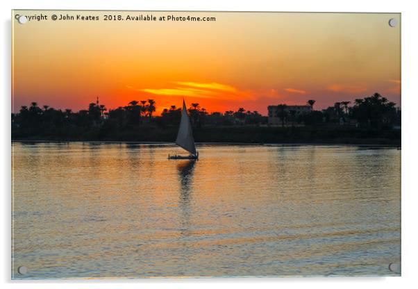 Sunset on the Nile River with Felucca boat sailing Acrylic by John Keates