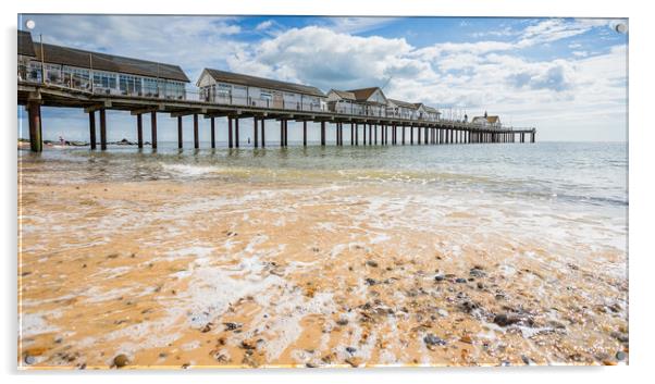 Waves wash back into the sea under Southwold Pier Acrylic by Jason Wells