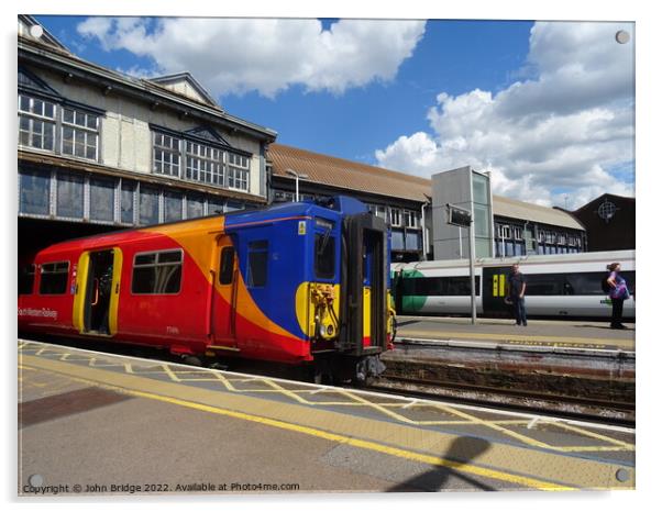 SWR Train at Clapham Junction  Acrylic by John Bridge