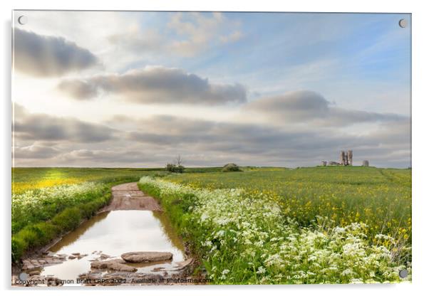 Flooded broken road leading to ruined Bawsey church Acrylic by Simon Bratt LRPS