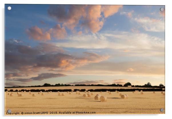 Norfolk hay bales basking in the sunset glow Acrylic by Simon Bratt LRPS