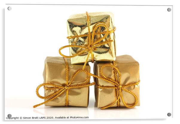 Three gold Christmas parcels Acrylic by Simon Bratt LRPS