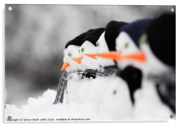 Line of carol singing snowmen Acrylic by Simon Bratt LRPS