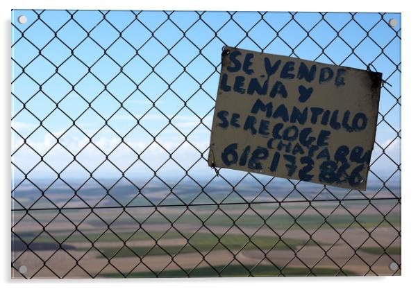 This is a barbed wire in front of a landscape of C Acrylic by Jose Manuel Espigares Garc