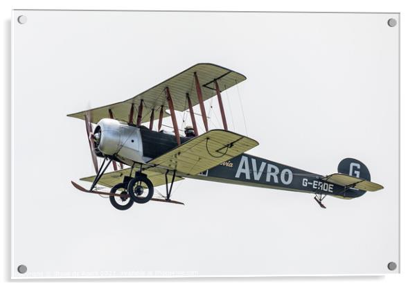 Avro 504K flies past in a cloudy sky Acrylic by Steve de Roeck