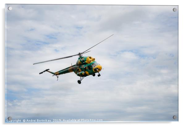 Khaki colored helicopter is flying in sky Acrylic by Andrei Bortnikau