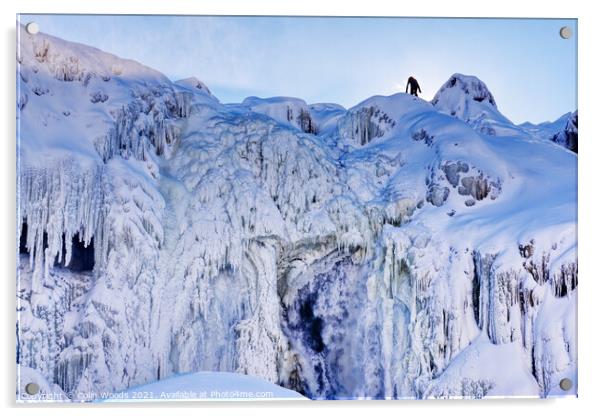 The figure of a person on the top of the frozen Chutes de Chaudière at Charny near Quebec City, Canada Acrylic by Colin Woods