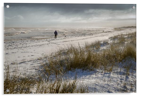 Person walking on a snowy beach Acrylic by GILL KENNETT