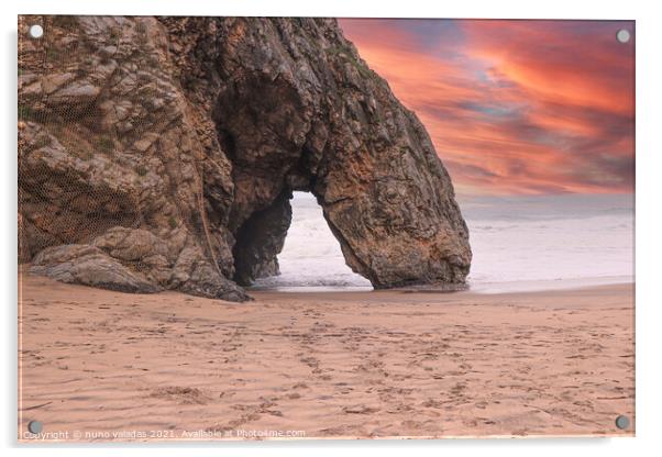 Beautiful stone natural arche. Rock formation in a beach with ocean in background at the sunset Acrylic by nuno valadas