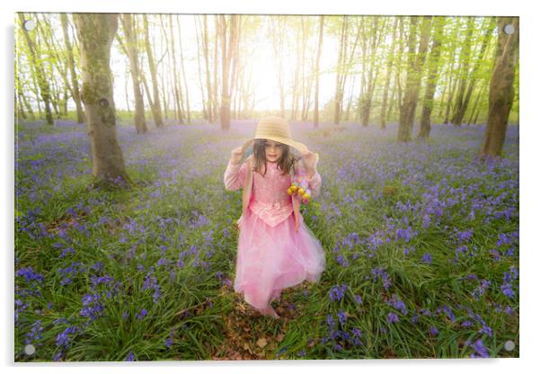 Small girl walks through bluebell woods in pink dress Acrylic by Alan Hill