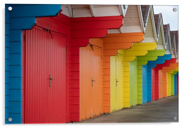 Colourful beach huts (de-focused near and far)  in a row on Scarborough North Bay Beach, Yorkshire, England Acrylic by Dave Collins