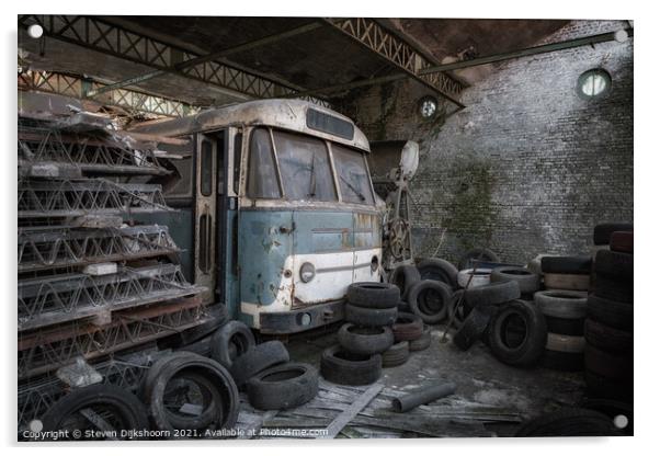 An old blue bus with tires surrounded Acrylic by Steven Dijkshoorn
