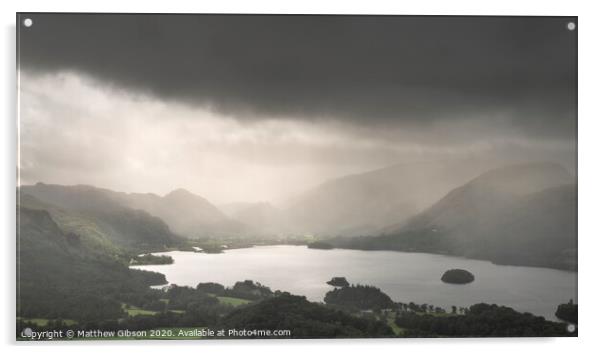 Stunning epic landscape image across Derwentwater valley with falling rain drifting across the mountains causing pokcets of light and dark across the countryside Acrylic by Matthew Gibson