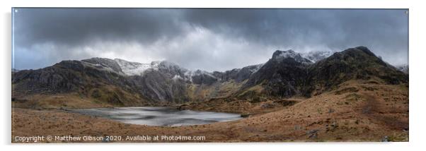 Beautiful moody Winter landscape image of Llyn Idwal and snowcapped Glyders Mountain Range in Snowdonia Acrylic by Matthew Gibson