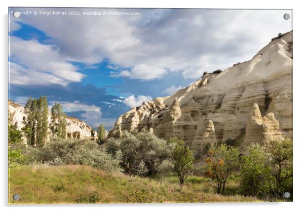 Bizarre and unusual mountain ranges and green valleys in Cappadocia in the rays of sunshine. Acrylic by Sergii Petruk