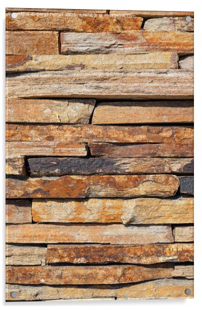 Brown slabs of old sandstone are lined with a wall. Acrylic by Sergii Petruk
