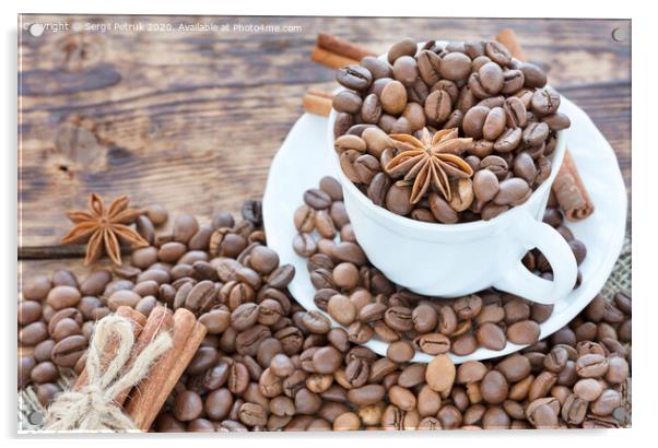 Grain coffee in a cup. Cinnamon on a platter and tied with string. Anise stars complement the aroma of coffee. Acrylic by Sergii Petruk