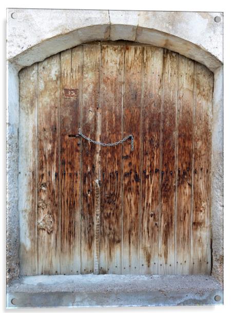 Ancient trapezoidal antique wooden doors with a metal lock in the middle Acrylic by Sergii Petruk