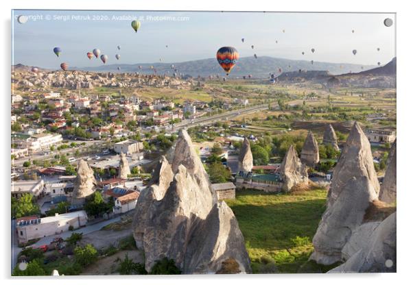 Dozens of balloons fly over the valleys in Cappadocia Acrylic by Sergii Petruk