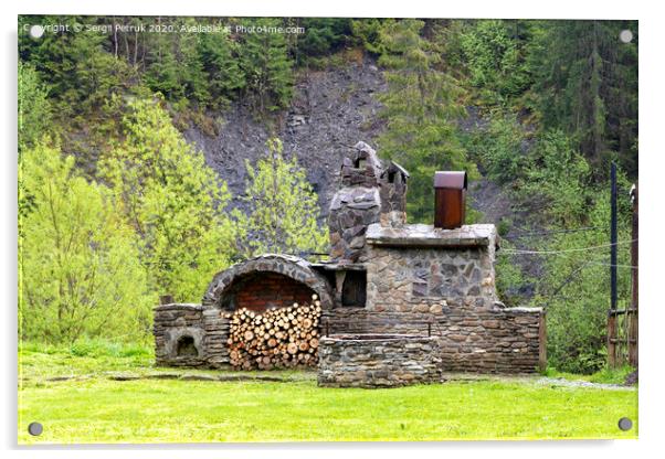 Old stone stove with firewood and smokehouse in the mountains of the Carpathians. Acrylic by Sergii Petruk