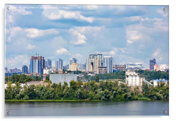 The beautiful cityscape of Kyiv with the Dnipro River, an industrial complex on the bank and new high-rise buildings on the horizon. Acrylic by Sergii Petruk