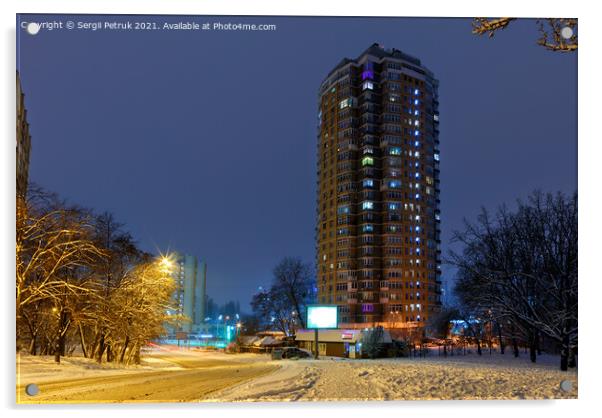 High-rise apartment building against the background of a city street in a winter city evening park covered with snow against a background of blue twilight. Acrylic by Sergii Petruk