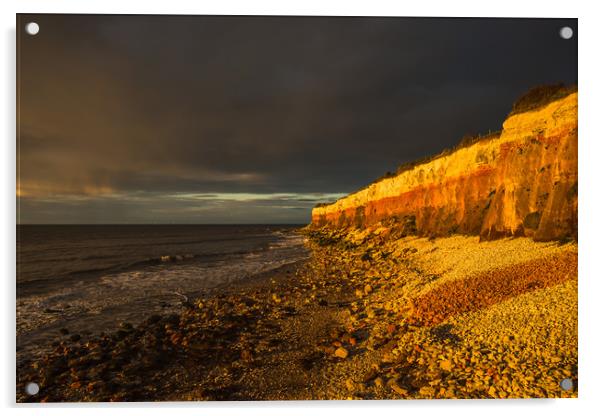 Hunstanton Cliffs at sunset with dark stormy sky Acrylic by Andrew Michael