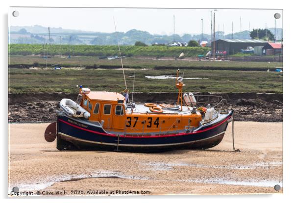 Lifeboat sitting on the mud flaps at Wells-Next-Se Acrylic by Clive Wells