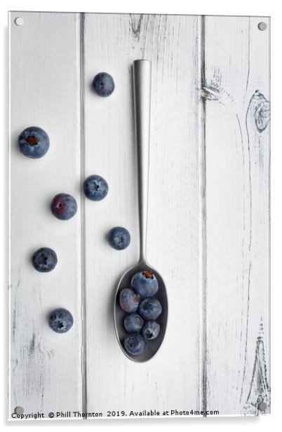blueberries and a silver spoon on distressed white Acrylic by Phill Thornton